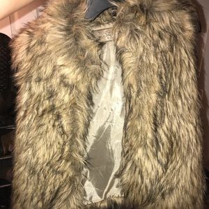 Black and brown fur vest